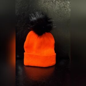 1 Orange Adult hat w/1 Black detachable pom Called Outdoor Flair. I make others